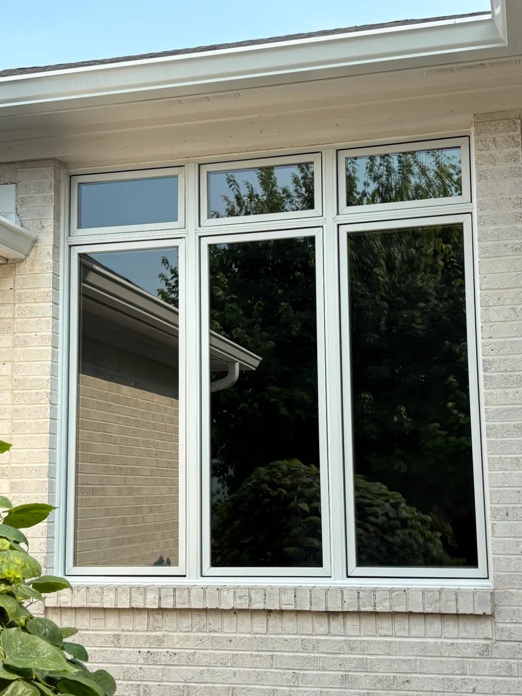 Storm-damaged window documented in Heritage Lake